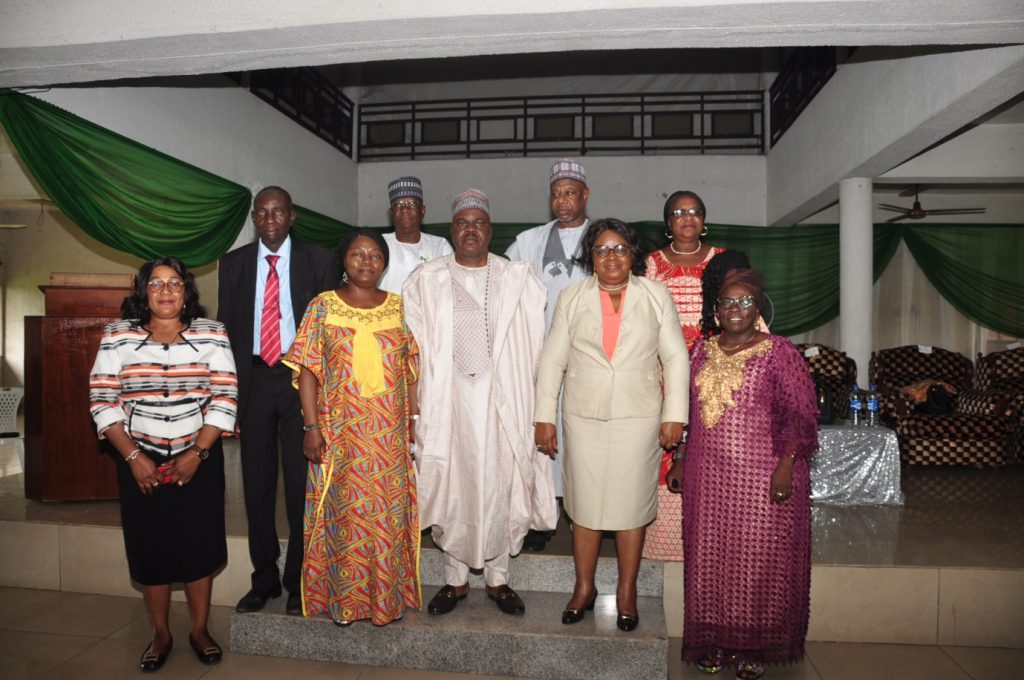 Chairman, NABTEB 10th Governing Board, Prof. Bem Angwe (middle, front row); Registrar/Executive, NABTEB, Prof. Ifeoma M. Isiugo-Abanihe (2nd right) and other members of the Governing Board pose for a group photograph shortly after the maiden meeting with the Management and Staff of NABTEB on Wednesday, 20th October, 2021, at NABTEB national headquarters in Benin City.