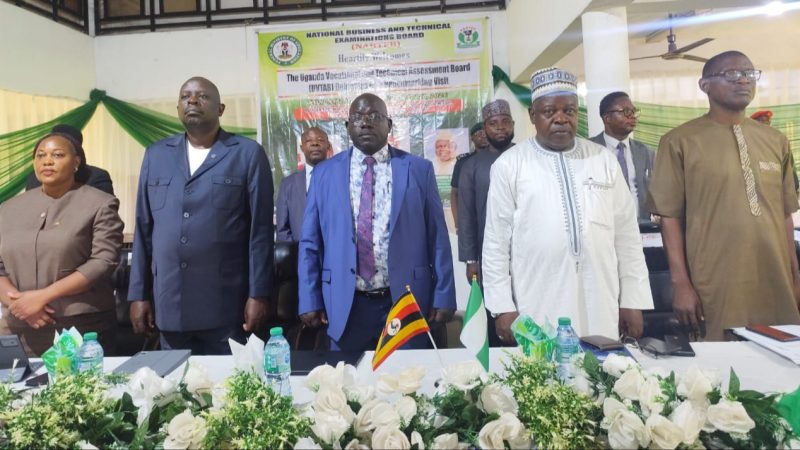 Representative of the Hon. Minister of Education, Mr. Kolawole Osundeyi (2nd right); Registrar/Chief Executive Officer, National Business and Technical Examinations Board (NABTEB), Dr. Mohammed Aminu Mohammed (2nd left); Board Member and Team Lead of the Uganda Vocational and Technical Assessment Board (UVTAB) delegation on Benchmarking Visit to NABTEB, Engr. Albert Akovuku (left); and Director, Examinations Administration, NABTEB, Ms. Chigoziem Susan Metu during the recitation of the national anthems of both Nigeria and Uganda at the opening ceremony of the Benchmarking exercise on Monday, 20th April, 2026, at NABTEB national headquarters in Benin City, Nigeria